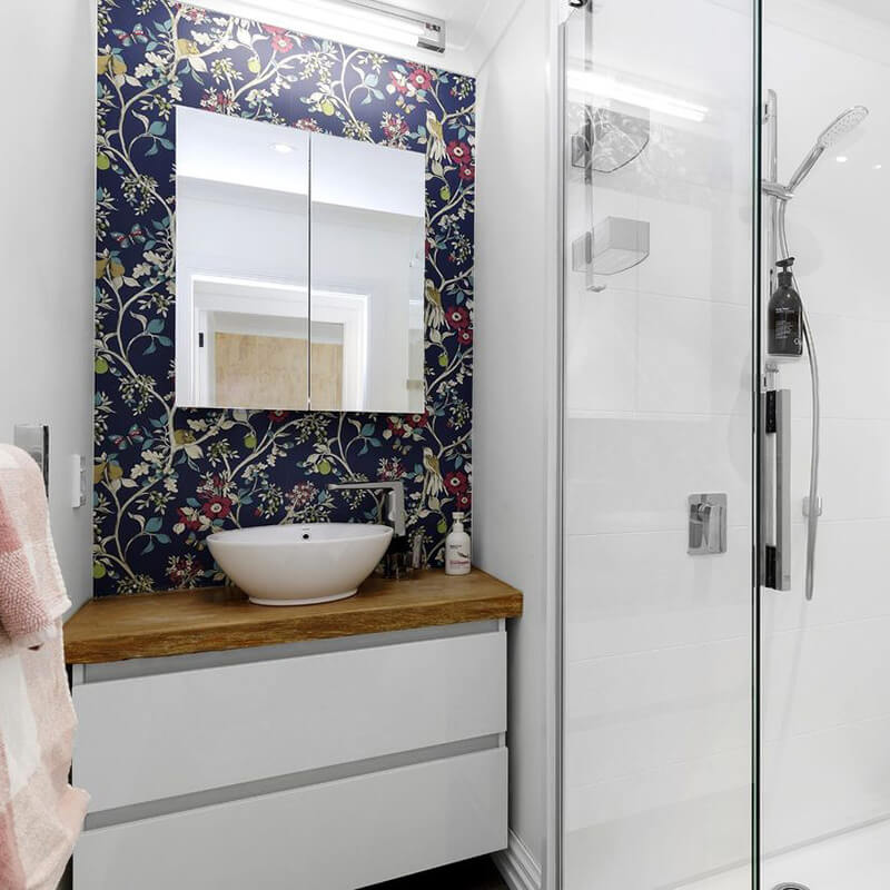 AP IMAGE V1 Modern bathroom renovation, beautiful floral tile and floating basin.